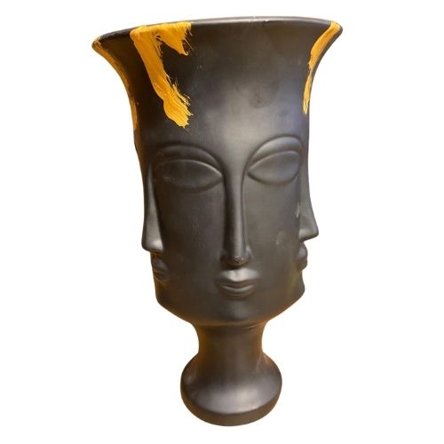 Many Faced Vase